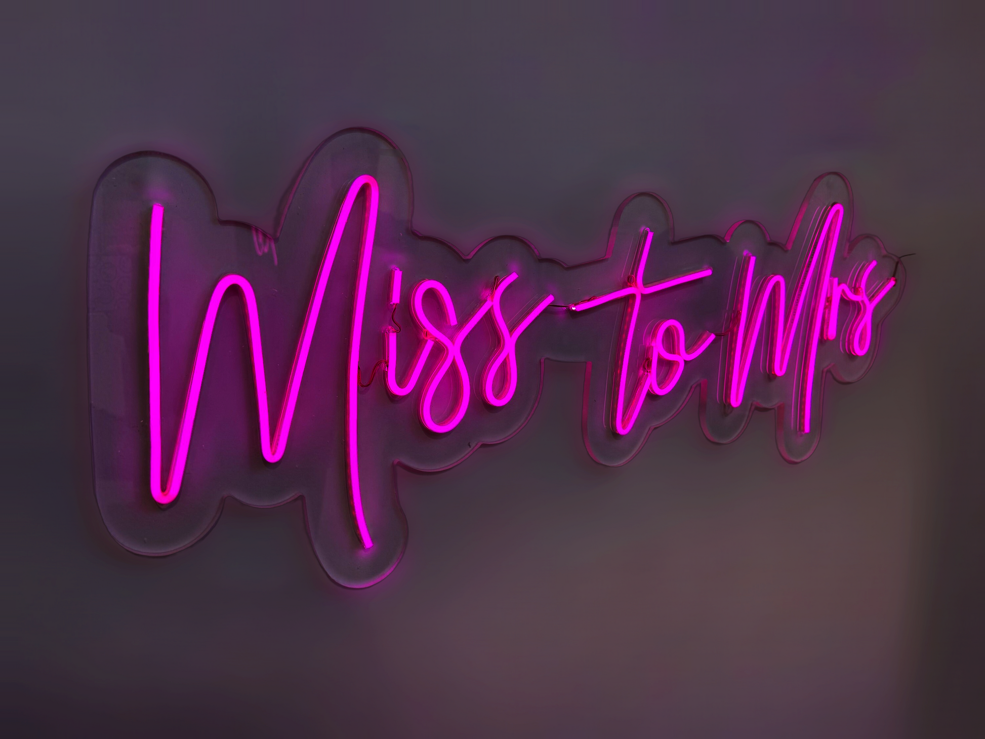 a neon sign that says miss to miss