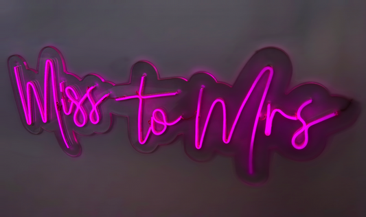 a neon sign that says miss to mrs